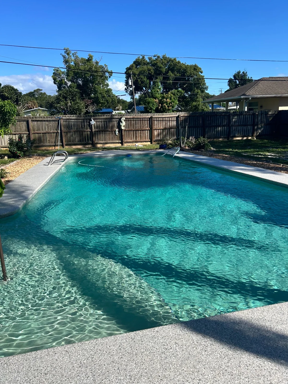 Clear swimming pool photographed by Crown Pools